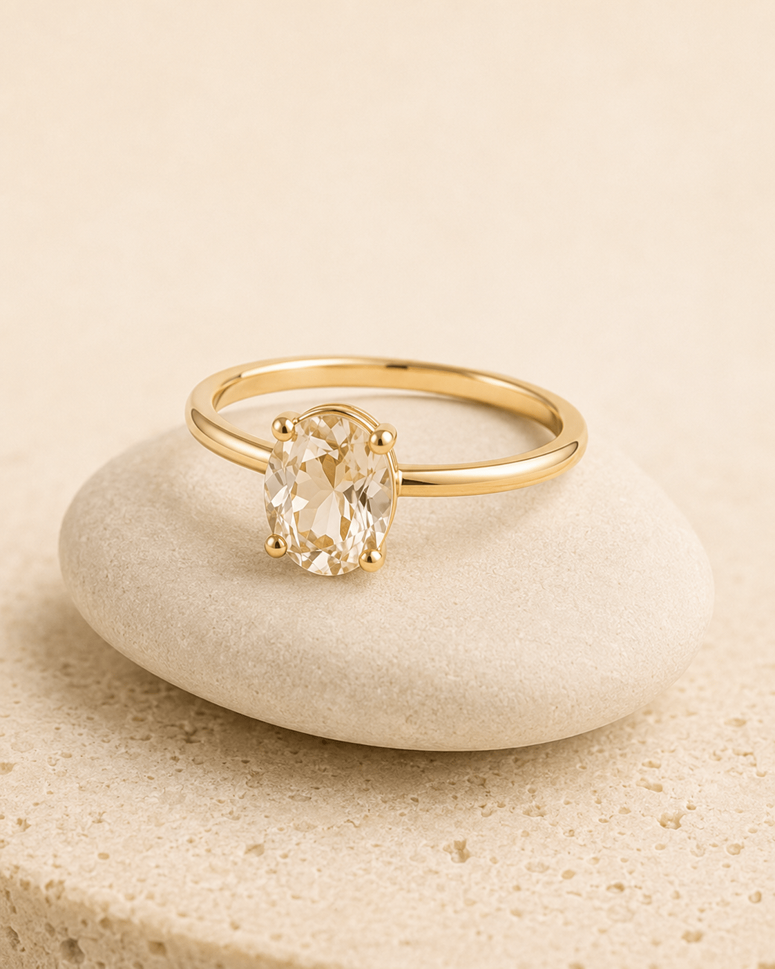 Celestial Oval Ring in 18k gold set with a clear oval stone